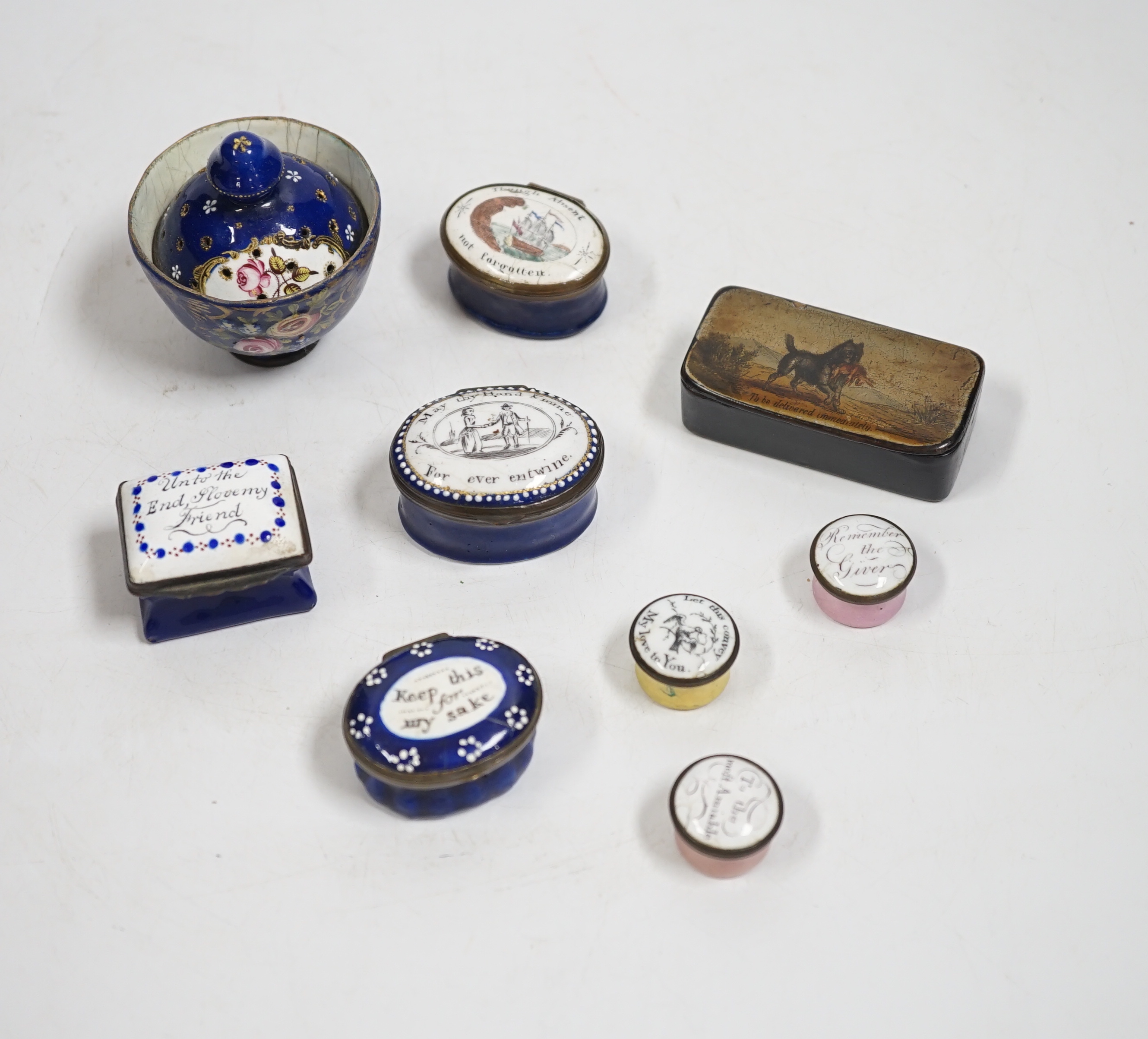 Two South Staffordshire enamel sweetheart patch boxes and two similar snuff boxes, three South Staffordshire enamel pill boxes, all late 18th/early 19th century, South Staffordshire enamel cup and associated cover and a